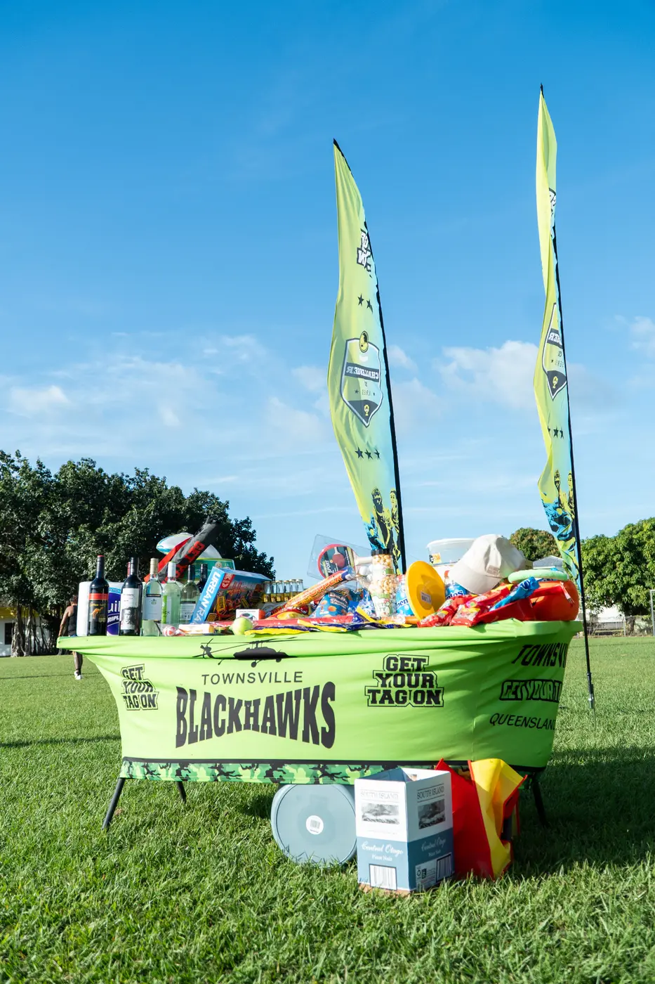 A Challenger event prize table filled with event day prizes